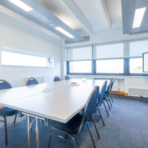 HWIC medium meeting room, laid out with a central boardroom-style table
